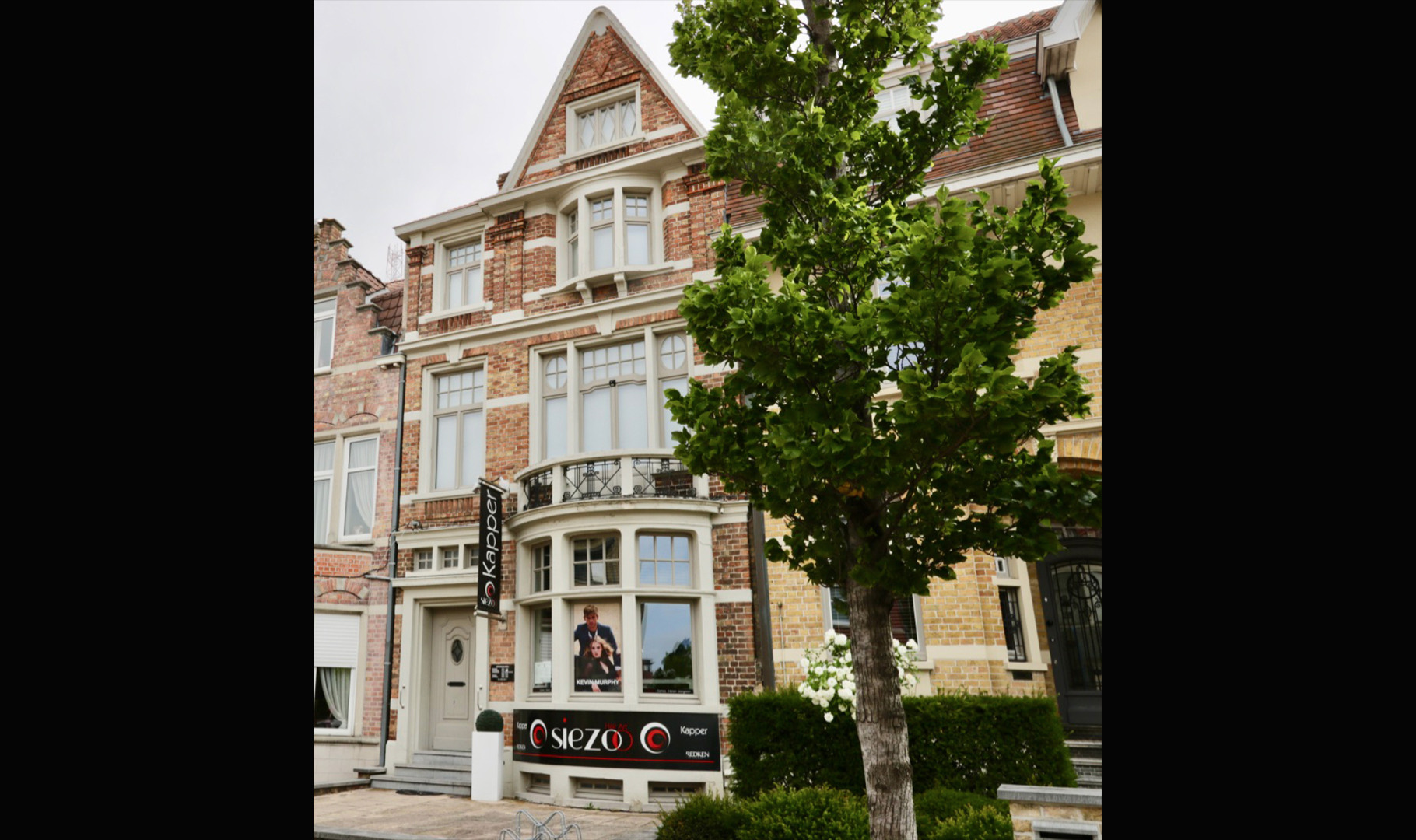charmant woon- en handelspand uit de jaren ’20 met zonnige stadstuin op een toplocatie op Kristus Koning
