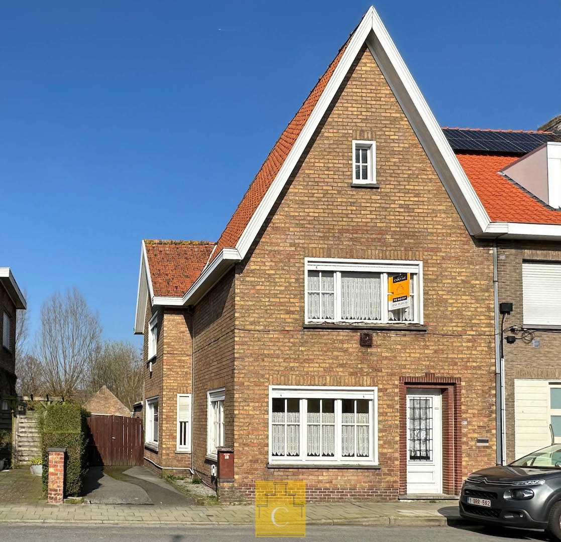 halve cottage met oprit, garage en zonnige tuin